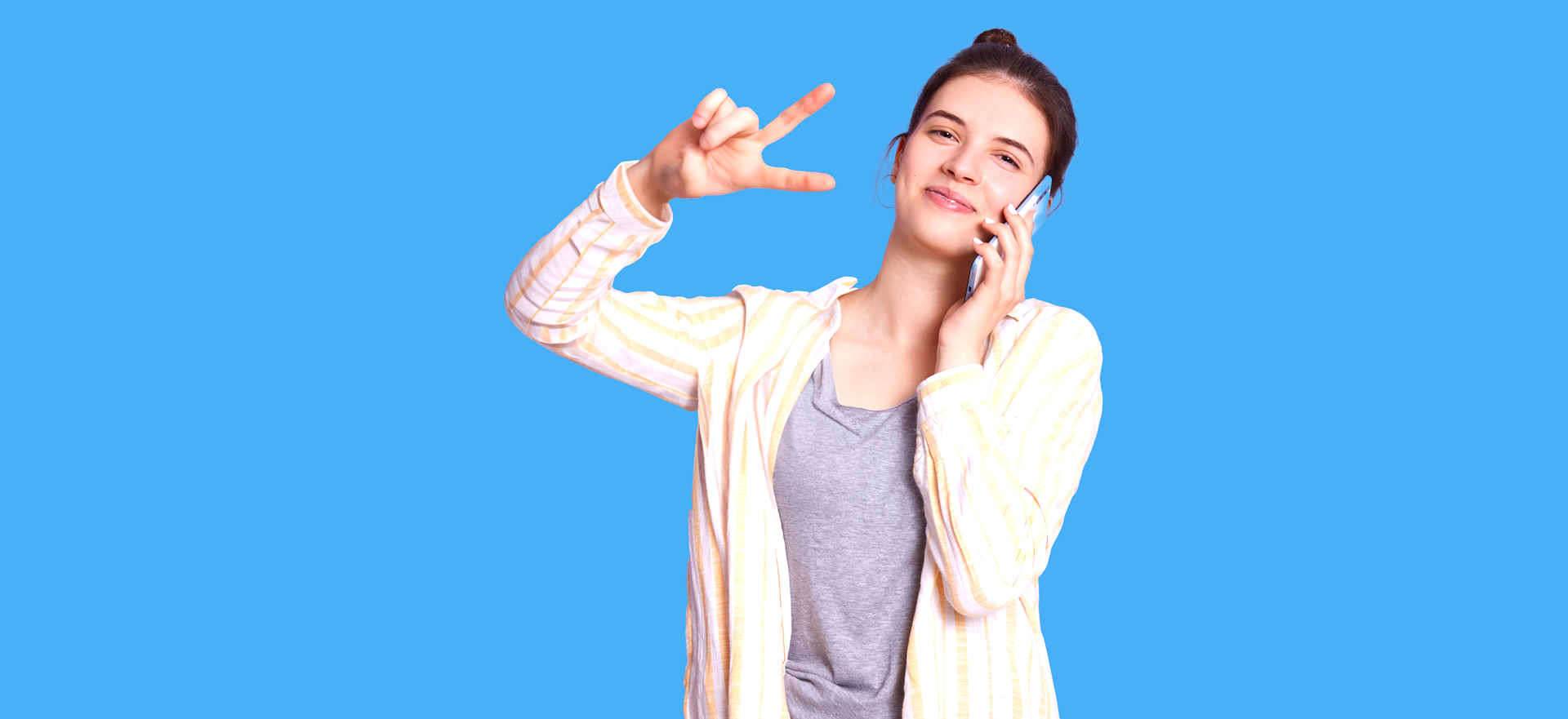 Satisfied Young Woman Talking Via Modern Smart Phone
